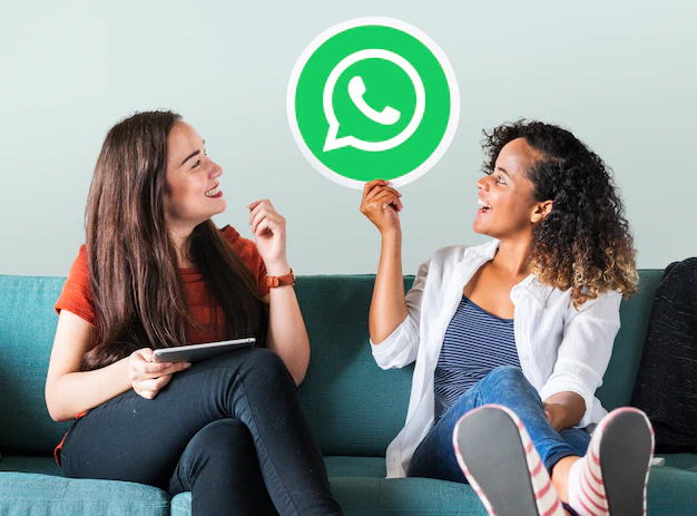 young-women-showing-whatsapp-messenger-icon_53876-41329
